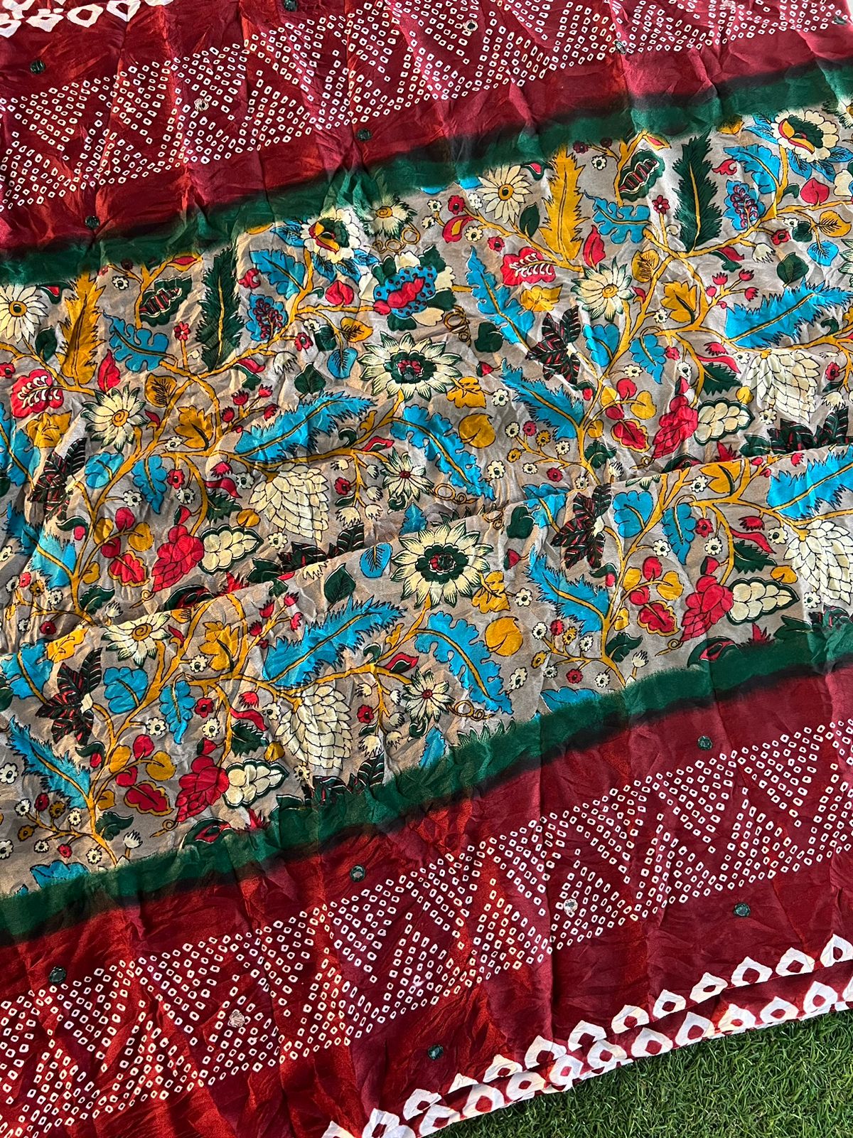 Fusion of kalamkari and bandhani printed crush silk saree