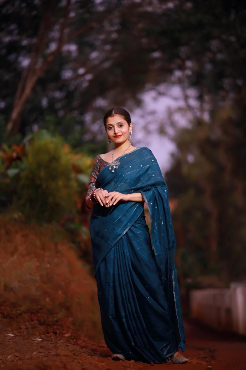 Linen with zari weaving checked saree