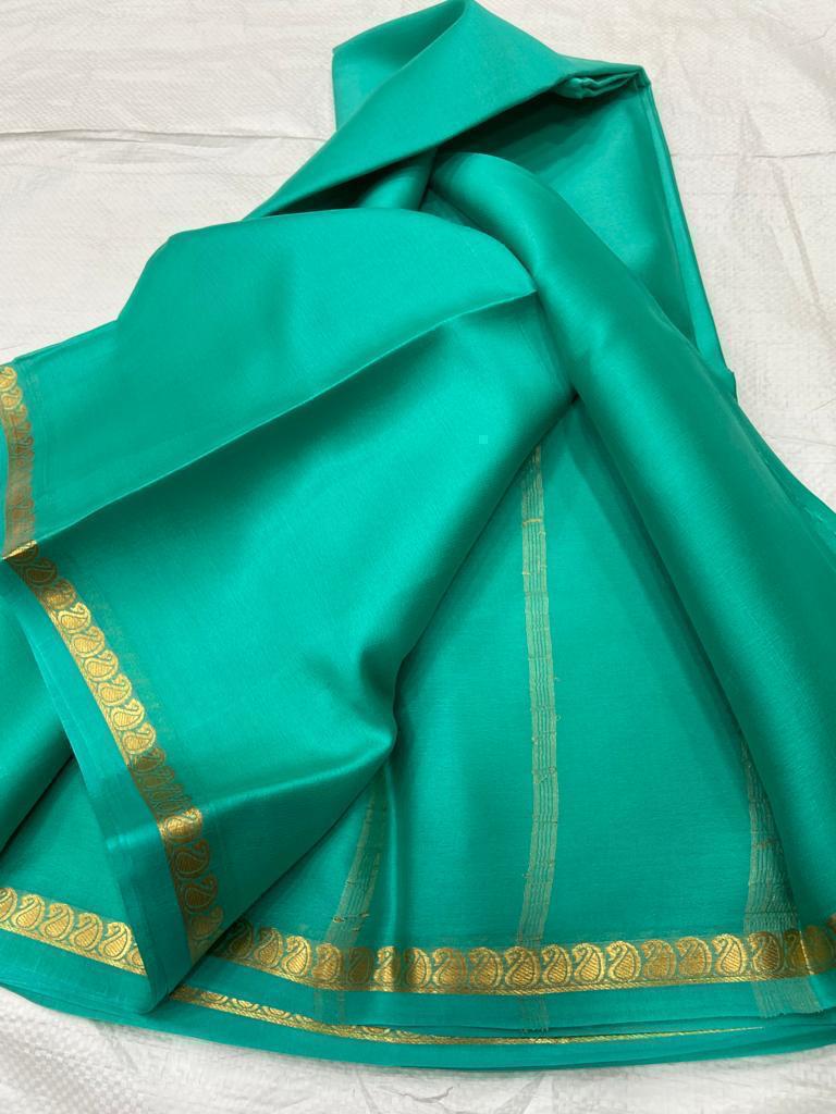 Pure mysore silk self color mango border saree