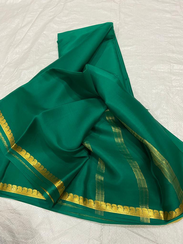 Pure mysore silk self color mango border saree