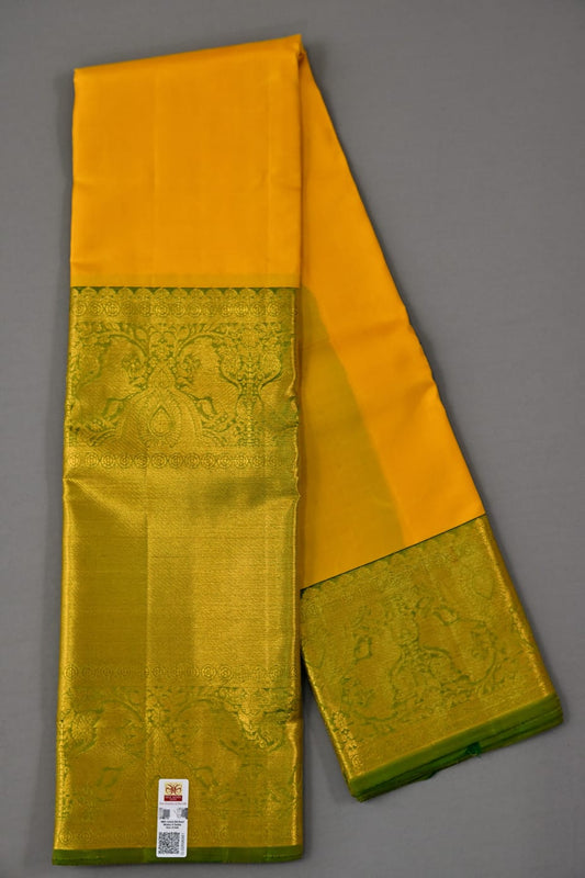 Pure silk kanchipuram plain in yellow with green color saree - Vannamayil Fashions