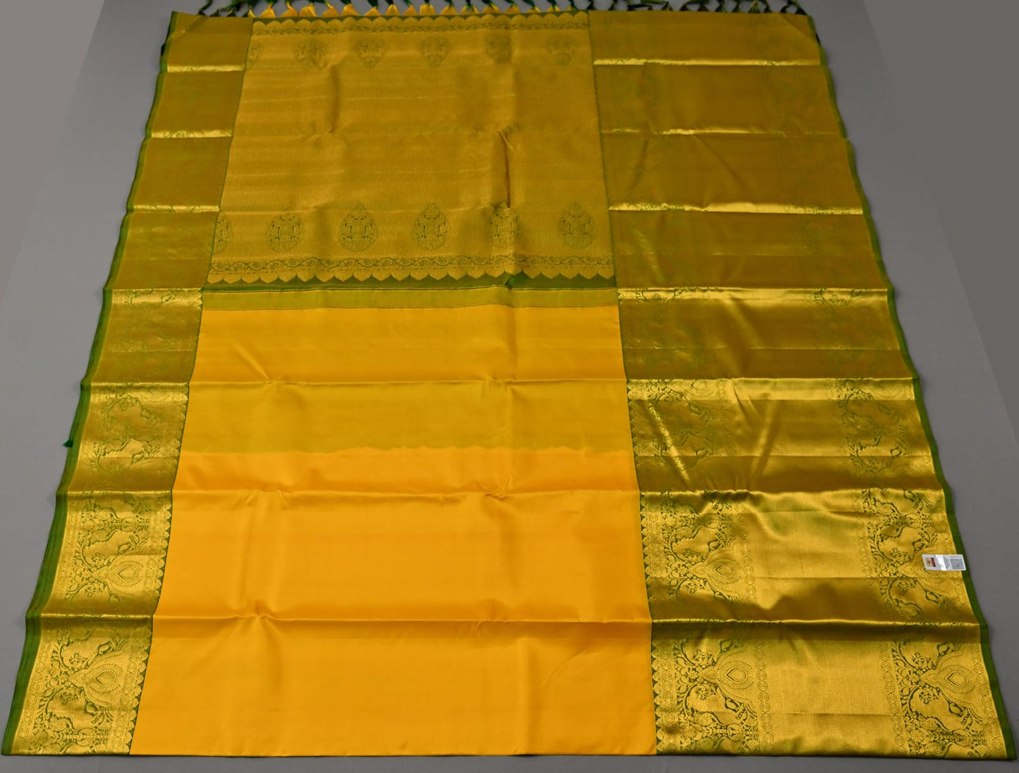 Pure silk kanchipuram plain in yellow with green color saree - Vannamayil Fashions