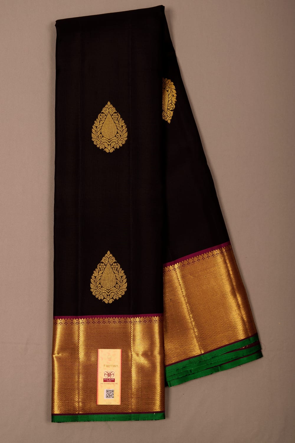 Kanchipuram black with magenta pure silk saree