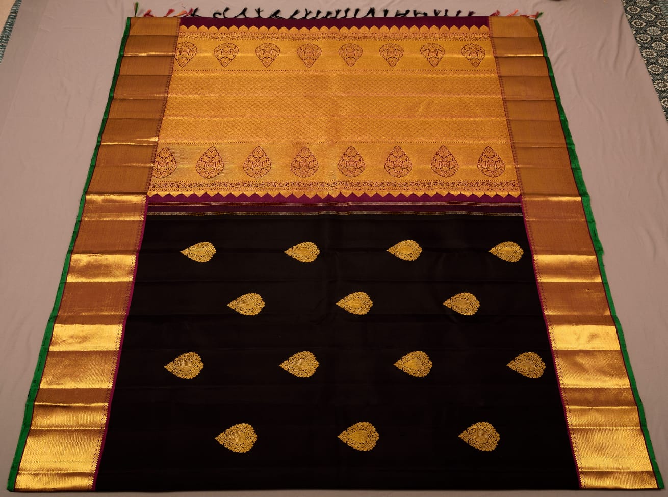 Kanchipuram black with magenta pure silk saree