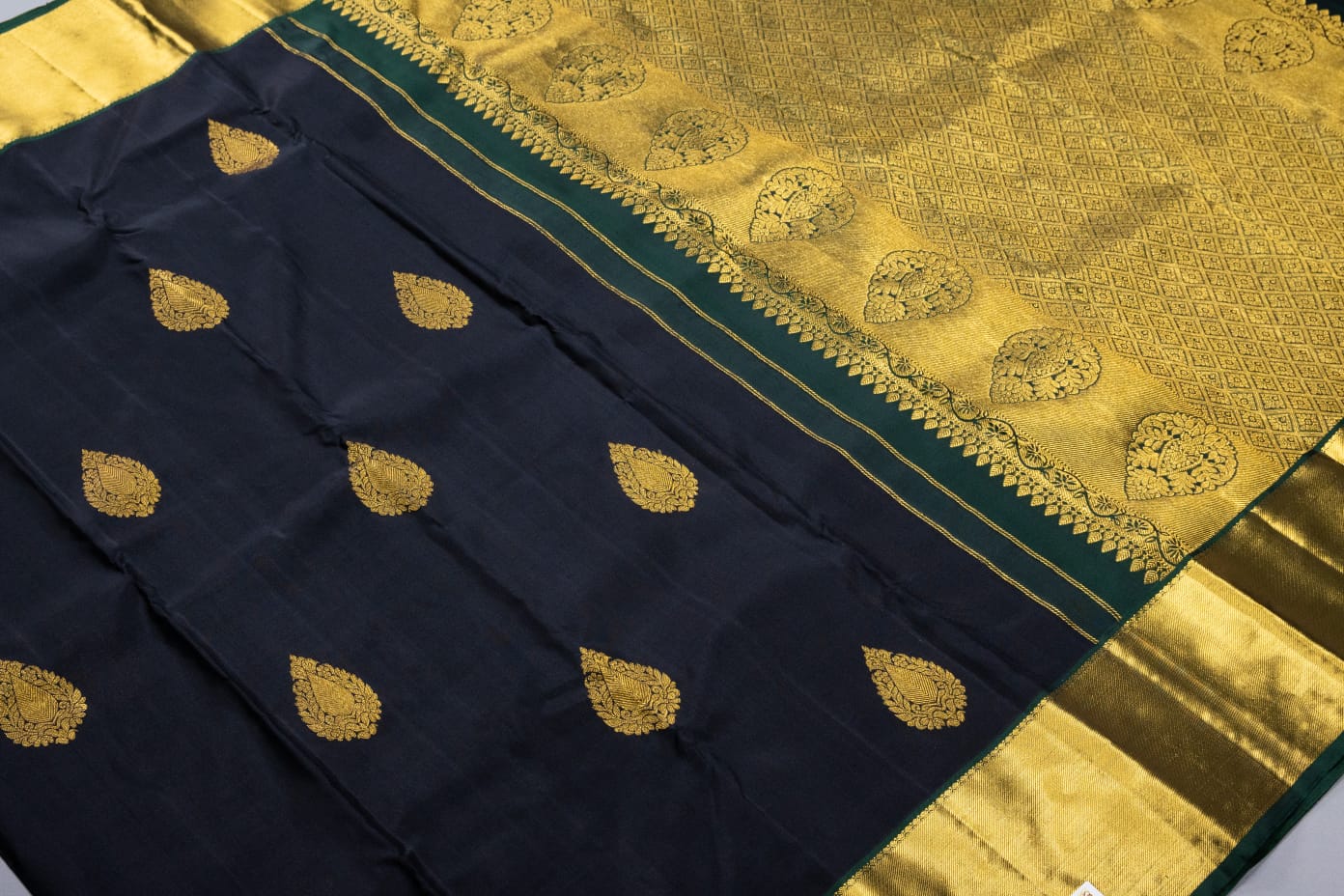 Kanchipuram pure silk black with green color saree