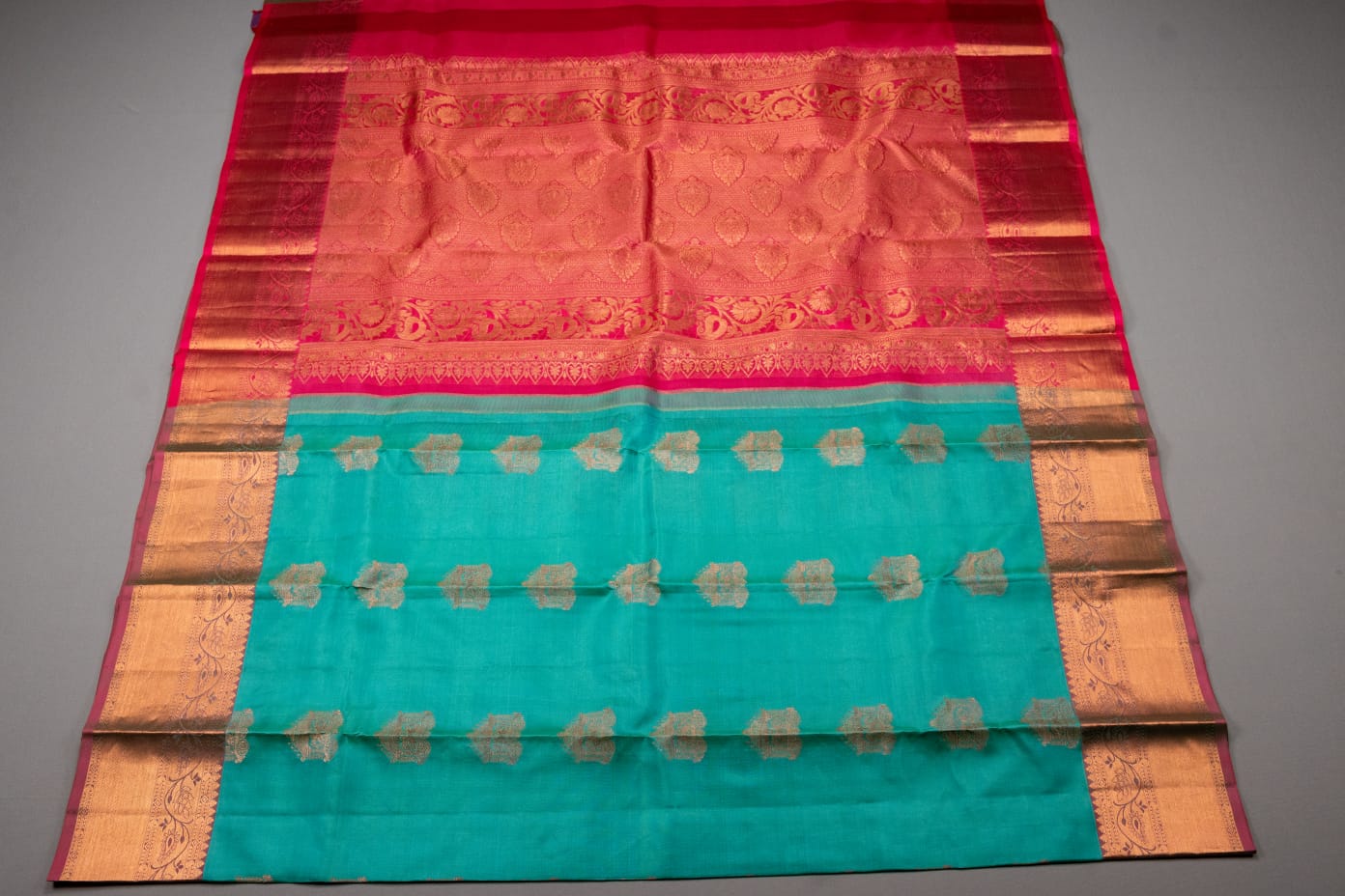 Kanchipuram turquoise blue and rani pink pure silk saree