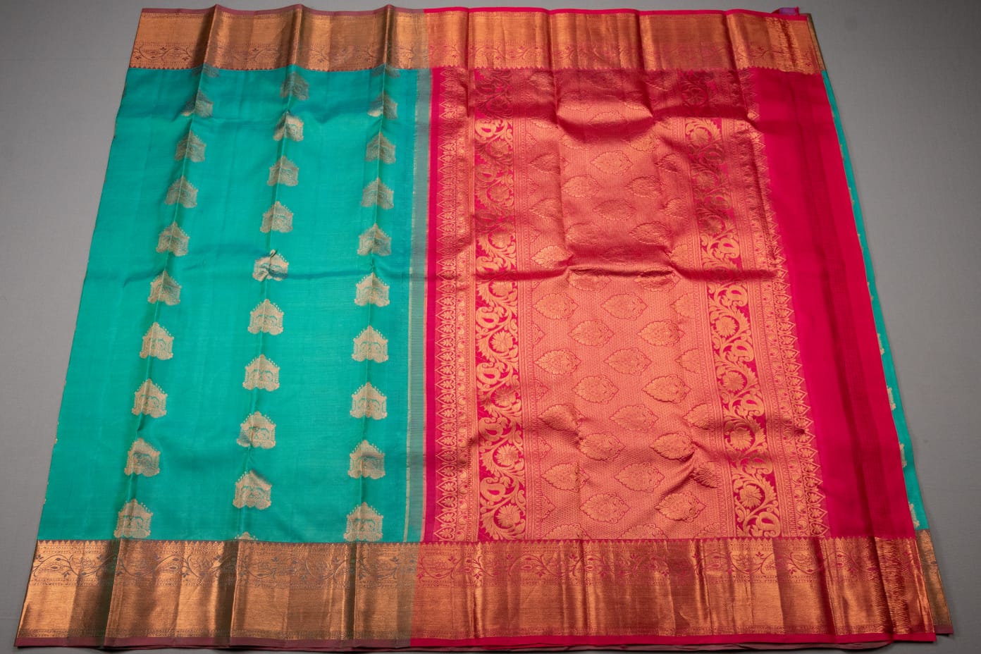 Kanchipuram turquoise blue and rani pink pure silk saree