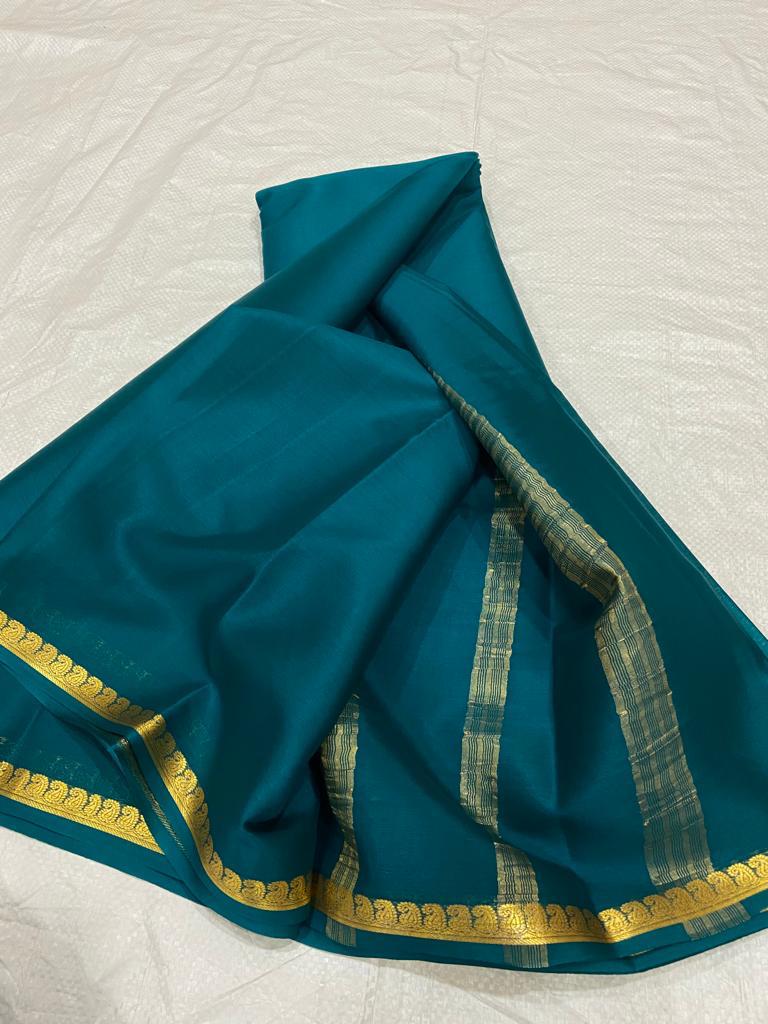 Pure mysore silk self color mango border saree