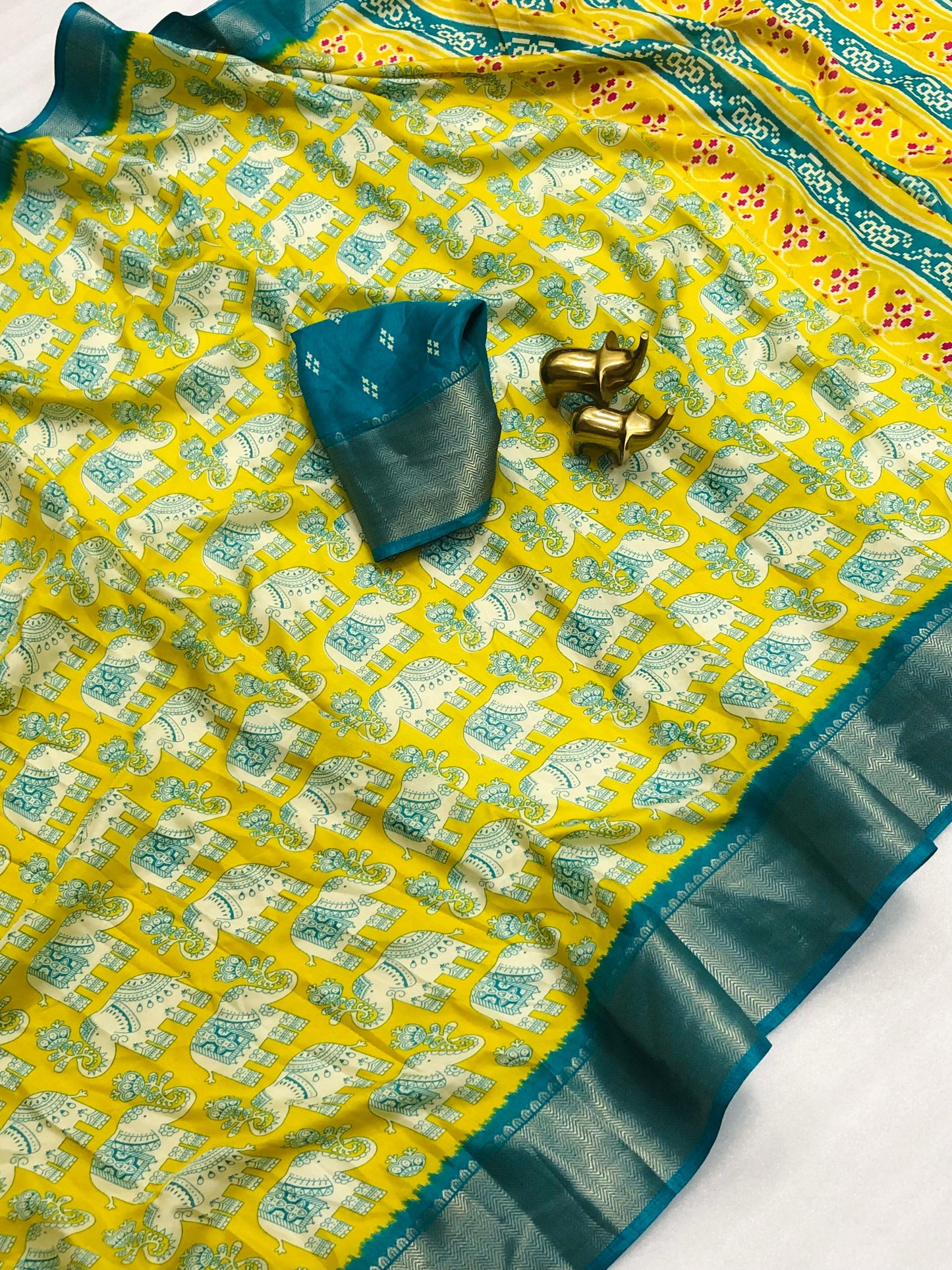 Soft Dola Silk Elephant Printed Saree With Heavy Zari Border