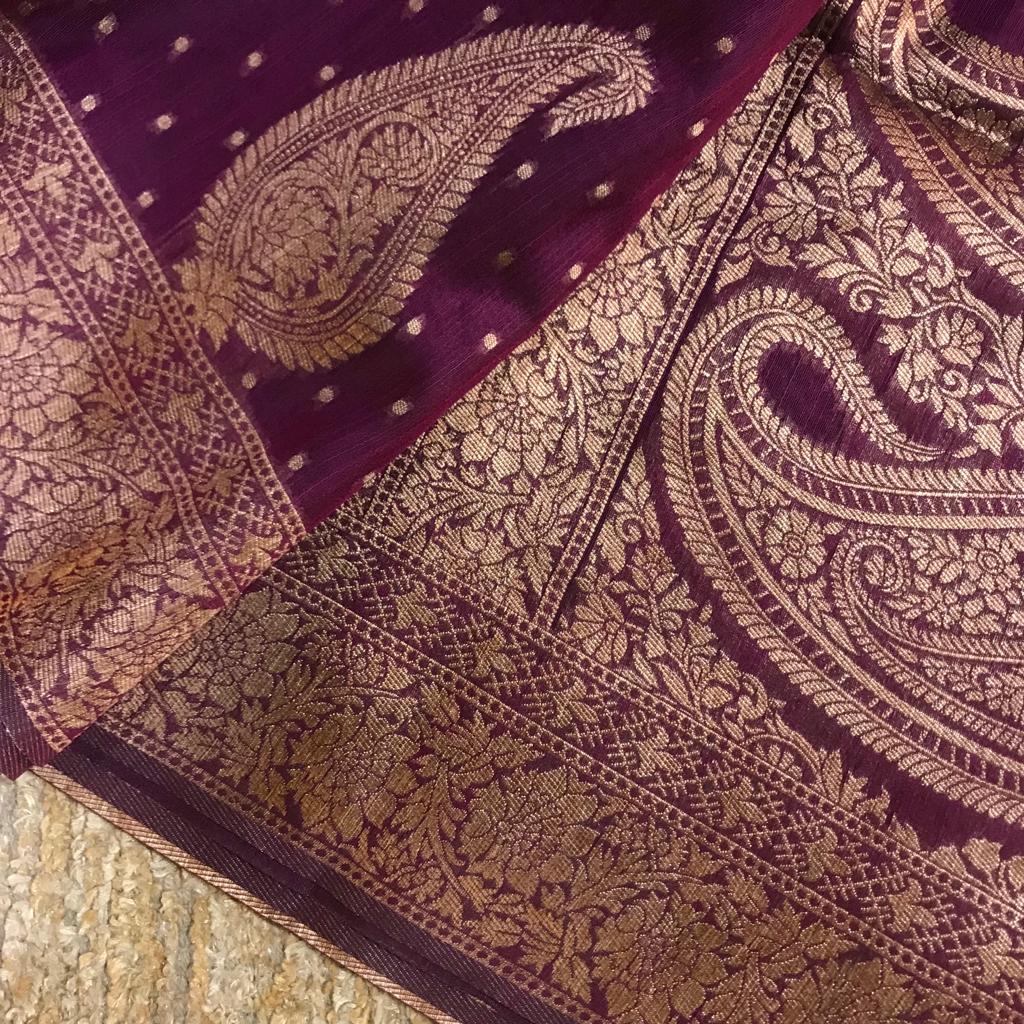 Dark violet and teal green in this of chanderi banarasi silk saree