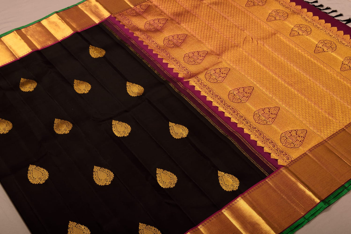 Kanchipuram black with magenta pure silk saree