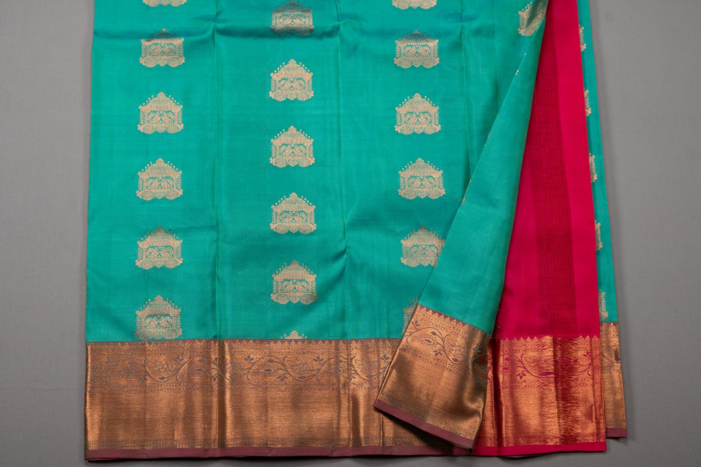 Kanchipuram turquoise blue and rani pink pure silk saree