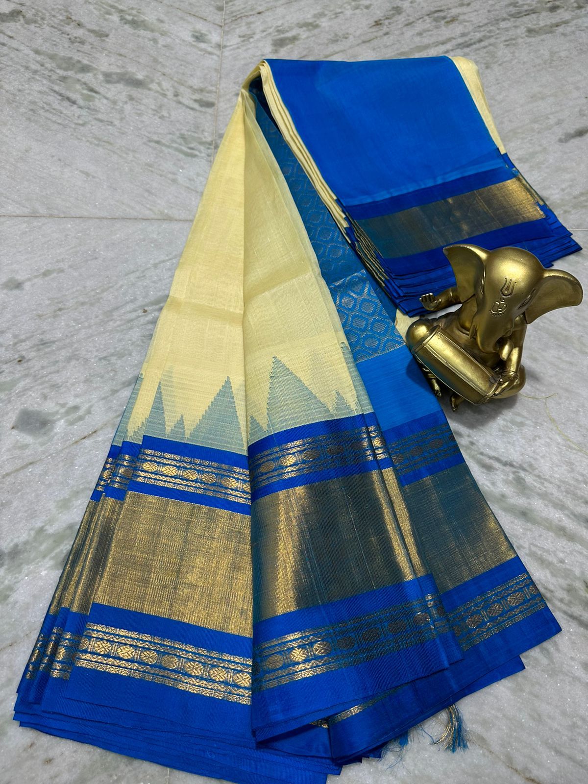 Queen of Hearts by Deepa Mehta - Turquoise Blue Dhoop Chhaon Kundalam  Kanjivaram Silk Cotton Saree The Kundalam Saree Buy now:  https://www.qohindia.com/products/turquoise-blue -dhoop-chaon-kundalam-kanjivaram-silk-cotton-saree The Kundalam saree is ...